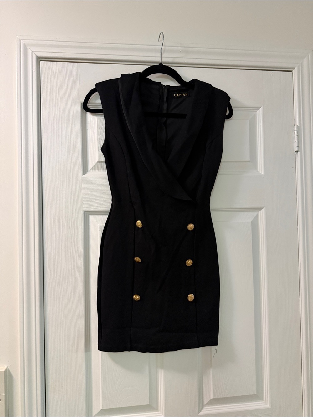 Sleek Black Sleeveless Double-Breasted Mini Dress by Cerian